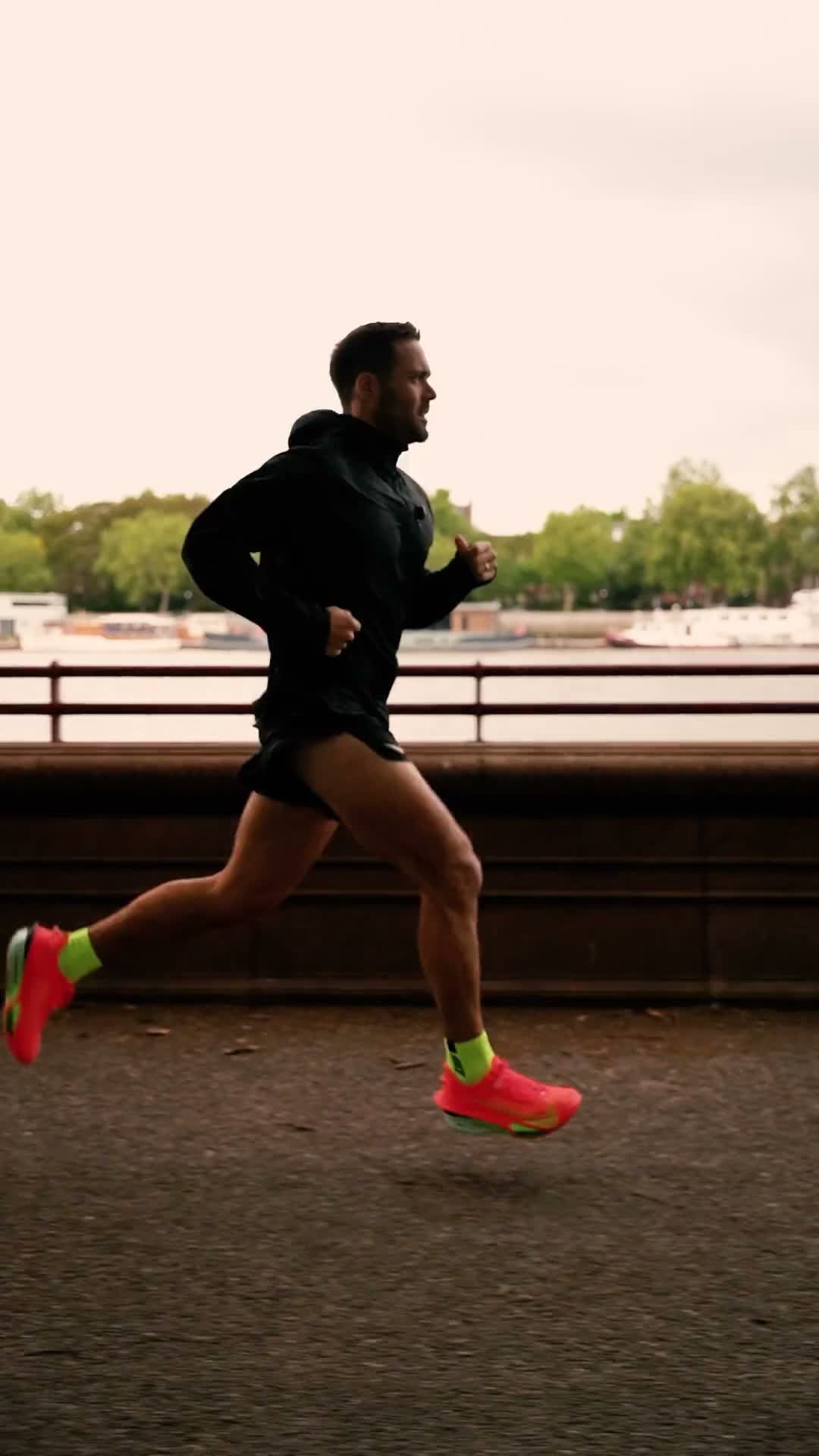 Spencer Matthews running through a park with WHOOP performance data overlaid